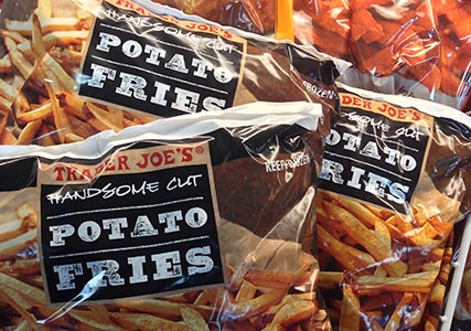 A bag of potatoes at Trader Joes, with Ashwood Extra Bold, a font from the Wild West Press